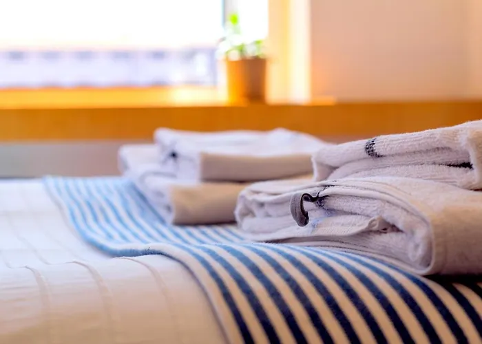 Ih & Casa de hóspedes